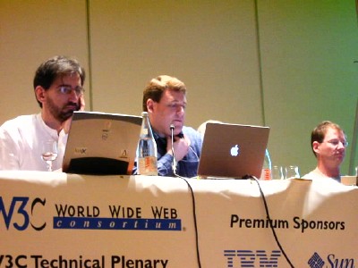 Norm Walsh, Roy Fielding and David Orchard seated on stage during the TAG presentation