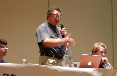 Micah Dubinko, Steve Ross-Talbot standing, and Lisa Seeman during lightning talks