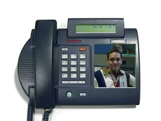 photo of a smart phone with Guillaume Belrose in the display